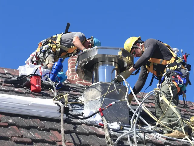 Protective chimney cap installed by North Royalton Chimney Sweep in North Royalton, OH