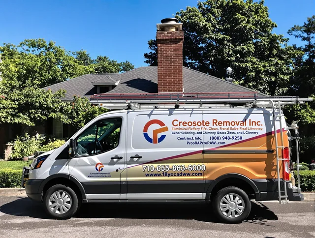 North Royalton Chimney Sweep technician removing creosote safely in North Royalton, OH